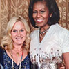 Katie Rocks wearing Samantha Sung cardigan and dress at the White House with Michelle Obama